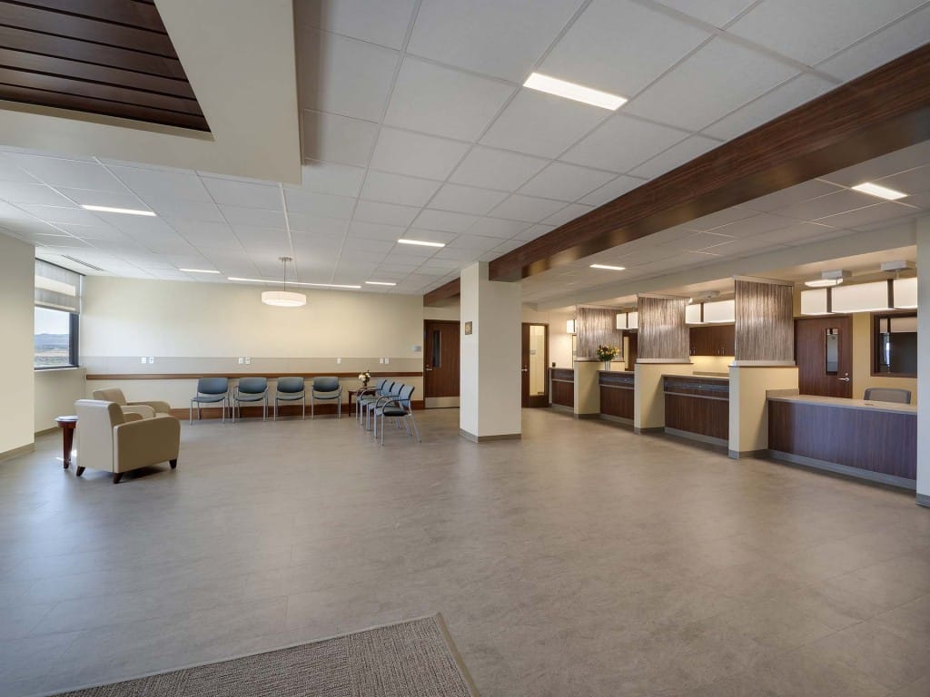 Waiting room with multiple desks and chairs