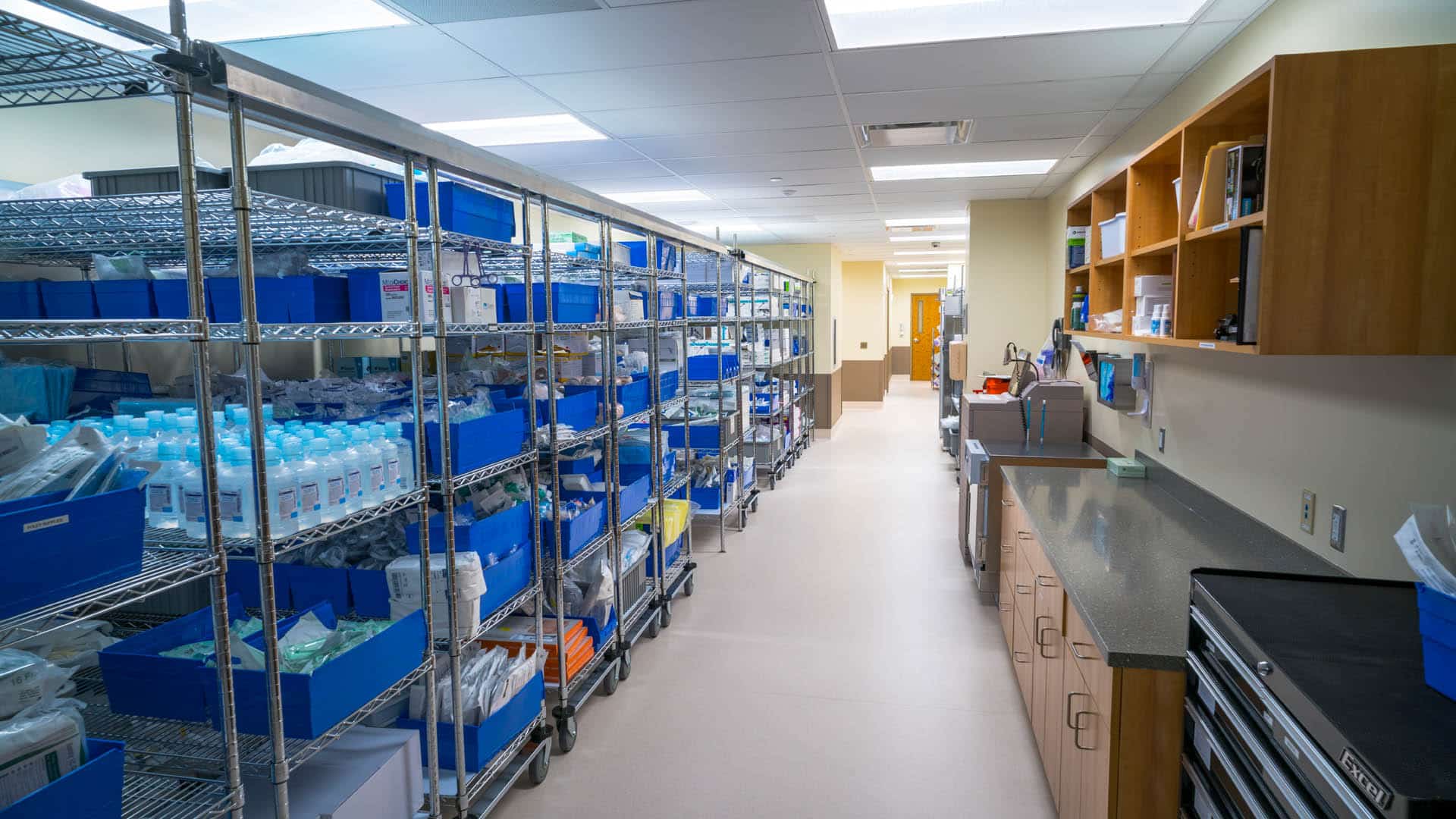 Storage room with metal racks full of medical equipment