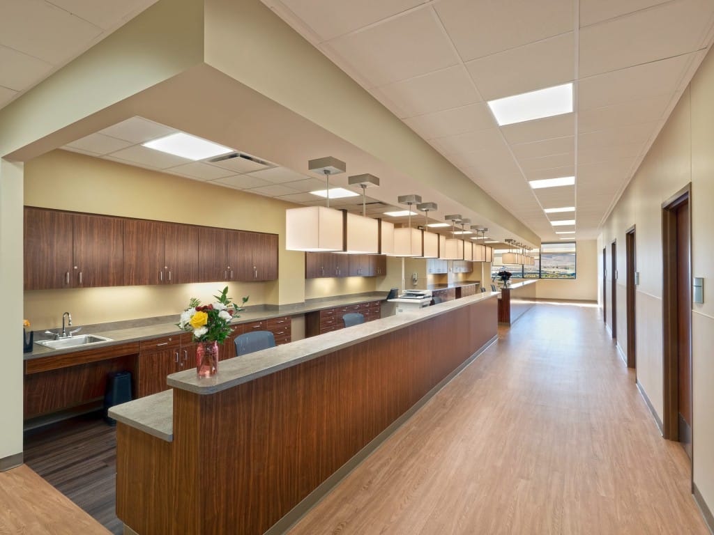 Hallway with nurses stations and doors